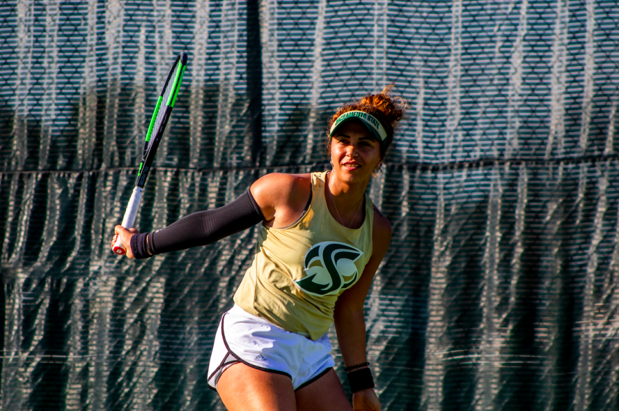 Sac+States+Ege+Tomey+looks+to+see+whether+her+returned+ball+makes+it+in+or+out+during+a+singles+game+home+match+on+Saturday%2C+Feb.+1.+The+Hornets+fell+to+the+University+of+San+Francisco+6-1.