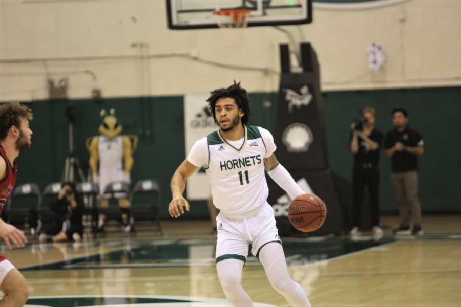 Sac+State+sophomore+guard+Brandon+Davis+drives+down+the+court+against+Eastern+Washington+at+the+Nest+on+Saturday%2C+Feb.+1.+Davis+averages+close+to+seven+points+per+game.