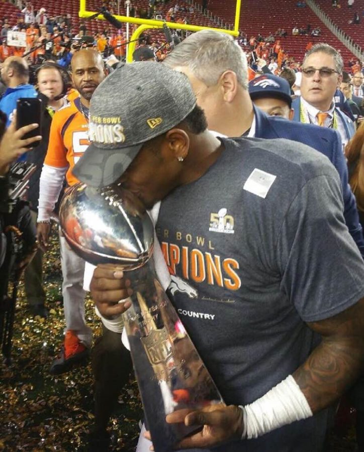 Former Sac State linebacker Todd Davis kisses the Lombardi Trophy after winning Super Bowl 50 with the Denver Broncos. Davis is second in career tackles at Sac State with 351. 