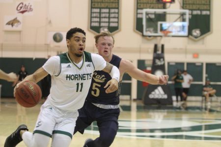 Sac State junior guard Brandon Davis driving to the rim, getting by his defender at the Nest against Montana State on Thursday, Feb. 27. Practice is currently limited to outdoors until the first possible regular practice on Oct. 14.