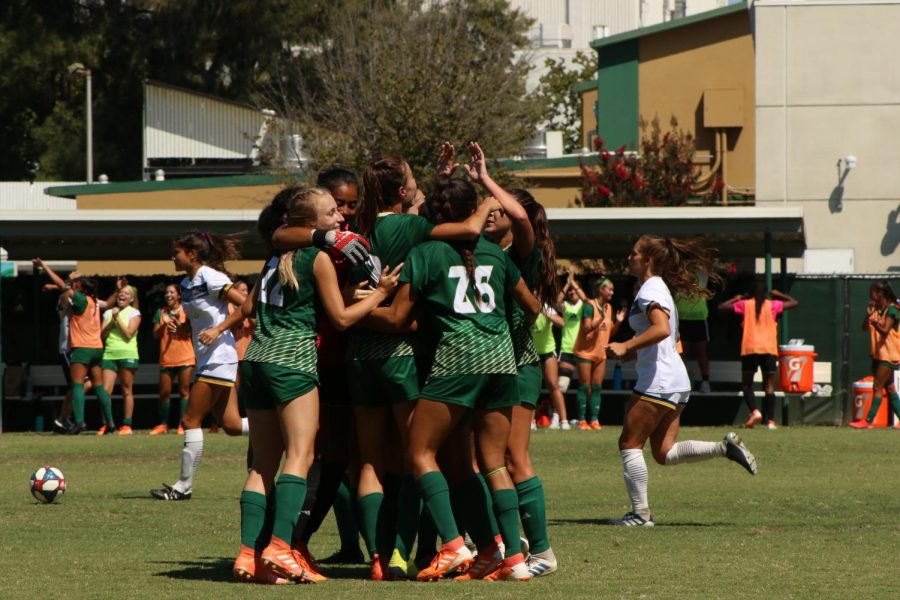 The Sac State women's soccer team celebrate the tying goal from junior forward Kylee Kim-Bustillos with about two minutes left in regulation against Cal Baptist on Sunday, Sept. 8, 2019 at Hornet Field. With the 2020 season on hold teammates Shay Valenzano and Christina Lazar organized a donation center for other members of the team to donate clothes, toiletries and shoes to the victims of California wildfires.
