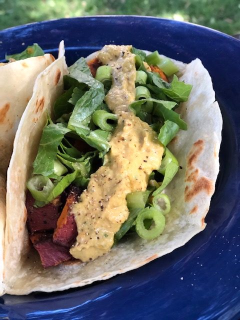 Sweet potato taco, romaine, scallions, spicy roasted persimmon and avocado salsa. 