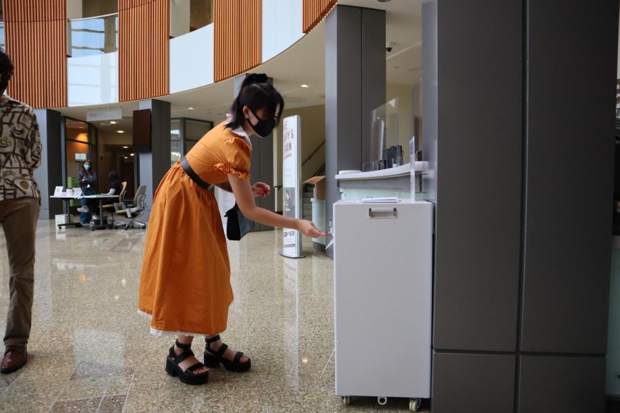 Baobye Thao, a Sacramento State womens studies major, turns in her ballot at The WELL on Sac States campus Monday, Nov. 2, 2020. Thao said voting to her is very important and that even though it was her first time and nerve-wracking, it was important that she be a part of the change in the 2020 general election.