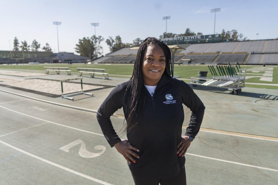 Sac State track and field assistant coach Kimberly Graham-Miller poses at the Hornet Stadium Monday, Oct. 26. Graham-Miller discussed the importance of female empowerment and support in athletics.