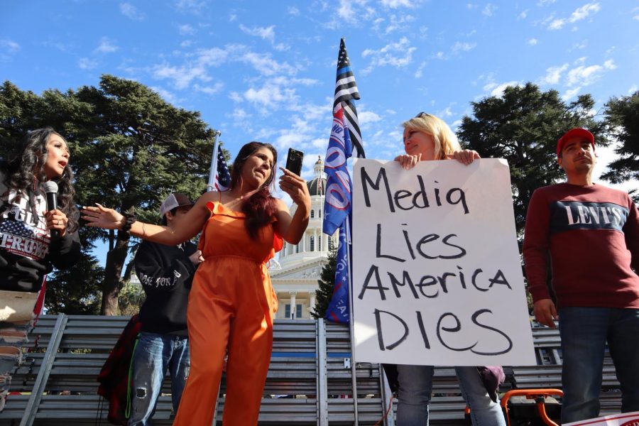 Lydia Mitchell (left), a pastor for The Path Ministry, spoke in-front of the pro Trump rally in advocacy of his campaign. She was one of numerous speakers at the Stop the Steal protest at the California State Capitol in Sacramento, California, Saturday, Nov. 7, 2020.