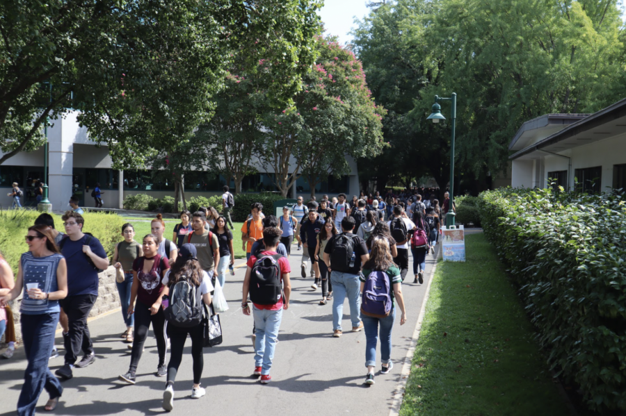 Sacramento State students walking on campus by Mendocino Hall in September 2019. The California State University system’s chancellor Joseph Castro reaffirmed that the CSU plans to return to a majority in-person instruction for fall 2021 at the CSU Board of Trustees meeting Tuesday.