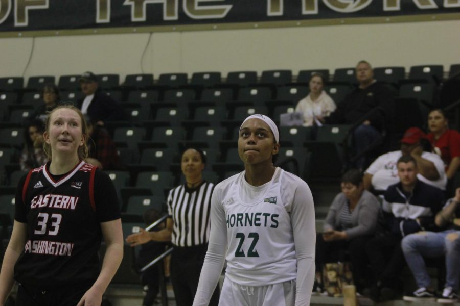 Sac State junior guard Kennedy Burks (right) and Eastern Washington sophomore guard Grace Kirscher (left) watch a free throw attempt at the Nest on Feb. 20.  Burks said the team has little time to devise a new strategy against the same opponent.
