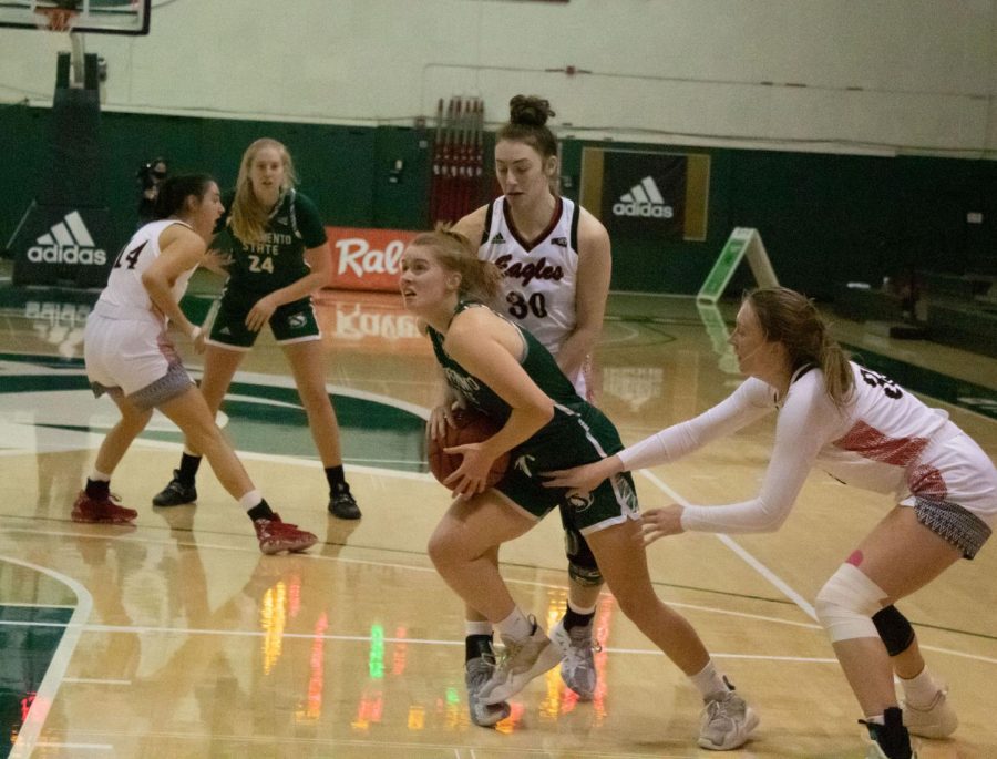 Junior guard Emily Enochs (#12) looks for a push to the basket during Sac State’s game against Eastern Washington Saturday, Jan. 30, 2021 at the Nest. The Hornets fell to 1-12 on the season after winning their first game against the Eagles on Thursday. 
