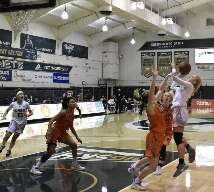Sacramento State’s Summer Menke attempts a jump shot in the first half of the game against Idaho State at the Nest at Sac State on Thurs, Jan. 14, 2021. The Hornets remain winless on the year. 