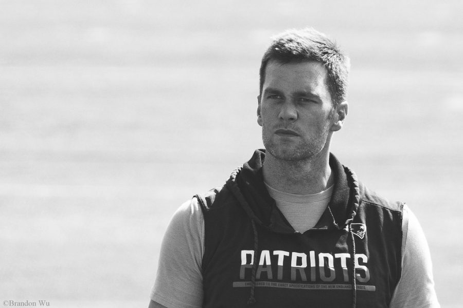 Then-Patriots quarterback Tom Brady pictured at Patriots training camp in July 2019. Copy editor Jordan Parker argues that Brady is the greatest football player ever after his seventh Super Bowl Victory last Sunday over the Chiefs. Tom Brady by BTW Photography is licensed under CC BY-NC-ND 2.0.