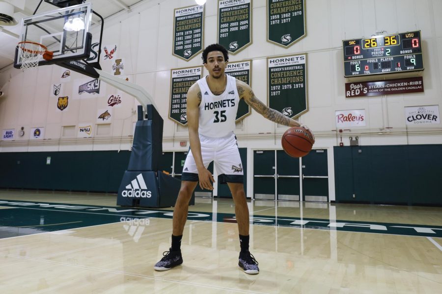Senior+guard+Christian+Terrell+dribbles+the+ball+for+a+photo+before+practice+at+the+Nest+at+Sacramento+State+Monday%2C+March+1%2C+2021.+Terrell+finished+the+season+with+11.9+points+per+game.