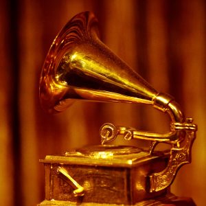 A photo of a golden Grammy Statuette, given to recipients of awards from the Recording Academy. (Photo by Thomas Hawk/CC BY-NC 2.0.)
