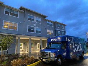 The Lark Sacramento’s bus sits parked in front of the Lark on Tuesday, March 9, 2021. A female resident of the Lark Sacramento entered the apartment complex’s clubhouse with a non-lethal weapon Tuesday evening, according to the Lark’s management. 