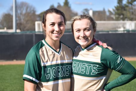 Sisters Alexis and Samantha Parish, pose for a photo together after a game at the John Smith Field at Sac State Saturday, Feb. 20, 2021. Alexis and Samantha are the first sisters to be on the Sac State  softball team together in 24 years. 