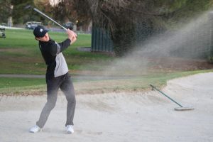 Sacramento State sophomore Ethan Davidson swings out of the sand on November 20, 2019 at Valley Hi Country Club in Elk Grove. Davidson achieved the best individual score, and the Hornets took home first place at the Big Sky Championship.
