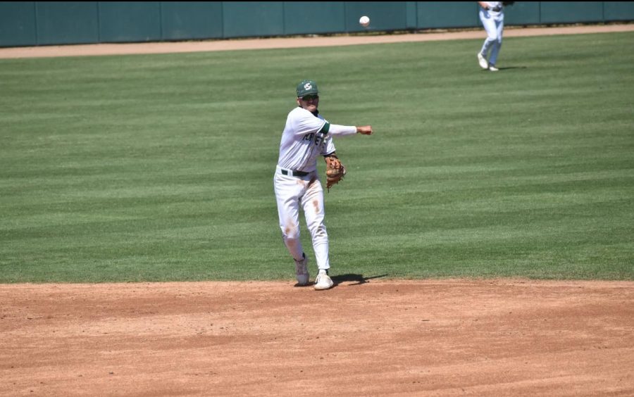 Sacramento State second baseman Jorge Bojorquez fields a roundball and throws to first in game one of Friday's action. The Hornets held on to win 10-5 at John Smith Field.
