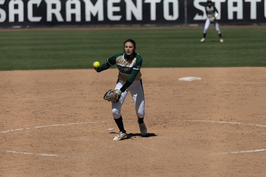 Sacramento State sophomore Marissa Bertuccio sends her fastball to the plate, where one of her teammates is waiting at home plate to practice their swing on Tuesday, March 30, 2021. Bertuccio has started 20 of the Hornets 33 games this season.