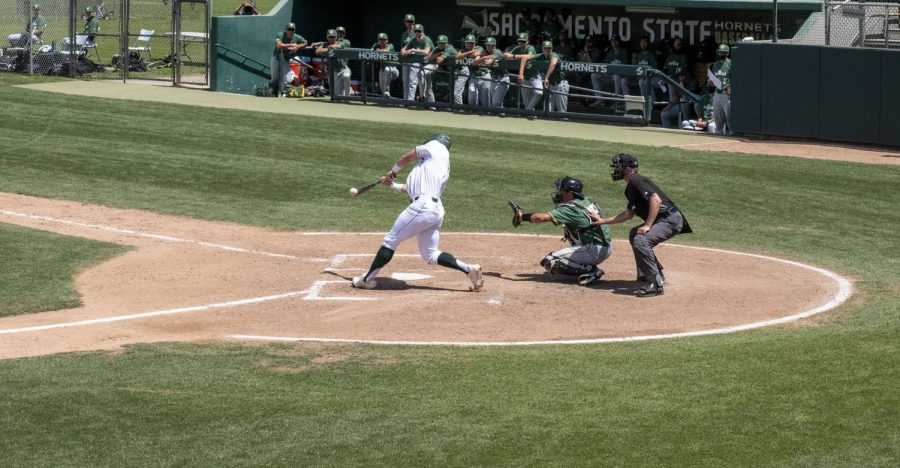 Sacramento State senior Steven Moretto hits a single in the bottom of the second inning in game one against the University of San Francisco at John Smith Field at Sac State on Saturday, May 15, 2021. Moretto had three at-bats with one hit.