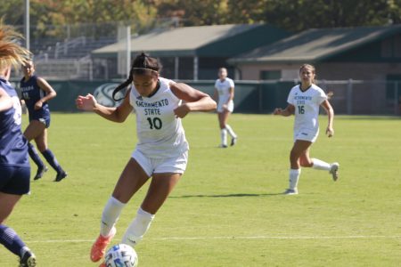 Senior forward Tiffany Miras dribbles through defenders Sunday, Sept. 4, 2021, at Hornet Soccer Field. The Hornets dominated the University of Nevada, Reno Wolfpack in a 3-0 win after coming to life offensively in the second half.