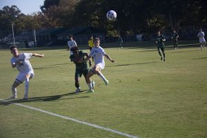 Hornets sophomore forward Titus Washington wrestles past a Cal Poly defender in pursuit of the ball Sept. 29, 2021 in a 1-1 tie at Hornet Field. The Hornets home record is now 0-3-1 on the season.
