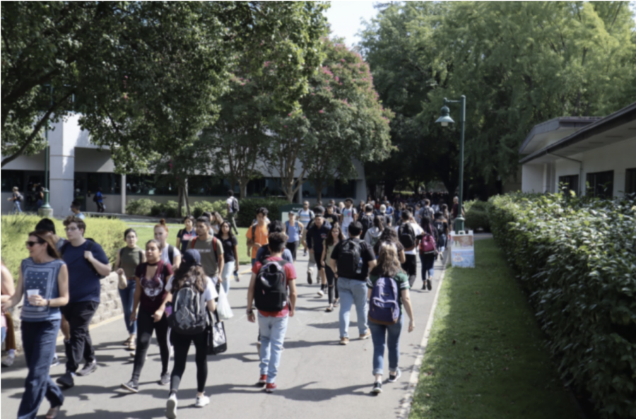 (File photo) Sacramento State students walking on campus by Mendocino Hall in September 2019. 4,306 Sac State students failed to meet the Sept. 13 deadline to self-certify their COVID-19 vaccination status, according to an email from Vice President of Student Affairs Ed Mills.