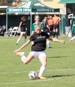 Sophomore forward Jasmyne Dunn takes a practice shot in warm-ups before Sac States match against Nevada at Hornet Field on Sunday, Sept. 5, 2021. The Hornets and Bulldogs game on Sunday, Sept. 19 ended in a 1-1 draw as Sac State came off back-to-back losses in the last two weeks.
