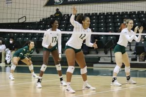 Sac State volleyball lines up in its first set against the Northern Arizona Lumberjacks on Oct. 7, 2021. The Hornets lost in three sets in their first home game after a two-game victory streak on the road.