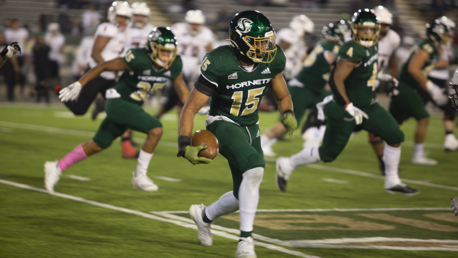 Sac State sophomore nickelback Marte Mapu (15) intercepts the ball from Southern Utah quarterback Justin Miller on Oct. 9, 2021, at Hornet Stadium. The Hornets beat the Montana Grizzlies 28-21 on Saturday Oct. 16, 2021 at Washington-Grizzly Stadium.