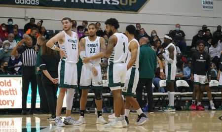  Sacramento State men’s basketball players gather during a timeout against UC San Diego on Saturday, Nov. 20, 2021, at the Hornets Nest. The men’s basketball team will take on UC Davis at the Golden 1 Center on Tuesday at 7:30 p.m in the return of the Causeway Classic. The women’s teams face off at 5 p.m.