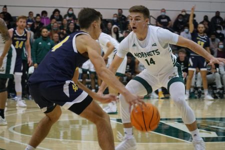 Senior guard William FitzPatrick playing tight on-ball defense against UC San Diego Saturday, Nov. 20, 2021 at the Hornets Nest. The Hornets suffered a 71-56 loss to the Tritons after failing to hold on to a first half lead.