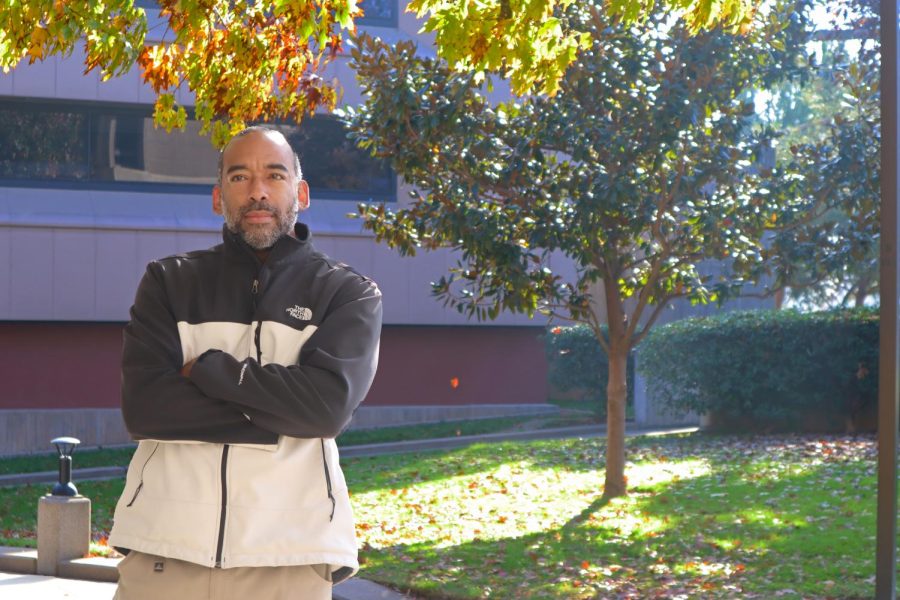 David Moore stands outside of Sacramento State’s Tahoe Hall on Friday, Nov. 12, 2021. As one of the only Black professors in business administration at Sac State, Moore said he has experienced more “coldness in isolation” after speaking out about his experience being racially profiled. 