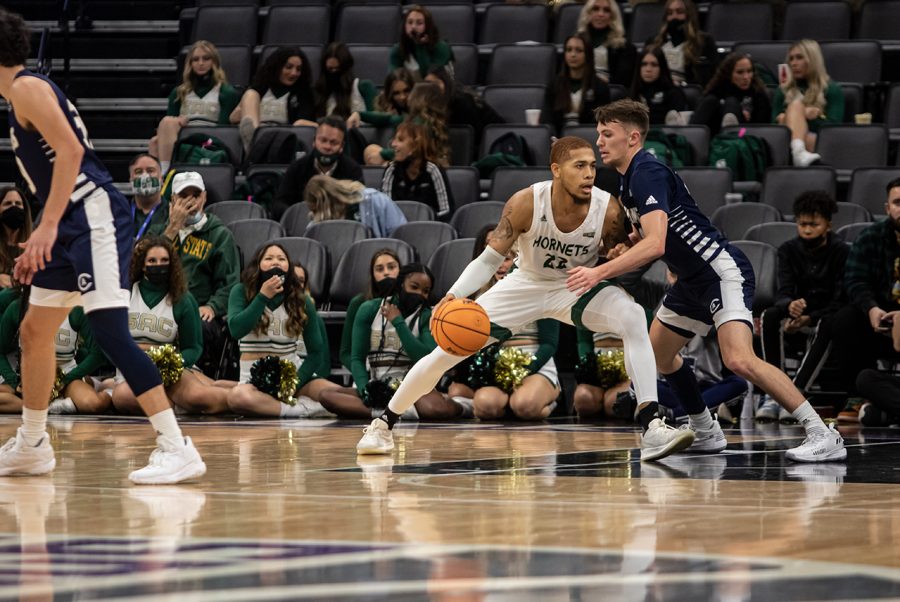 Sophomore forward Cameron Wilbon (22) pushes into the key Tuesday, Nov. 24, 2021 at Golden 1 Center. The Hornets beat the UC Davis Aggies in the Causeway Classic 75-63.