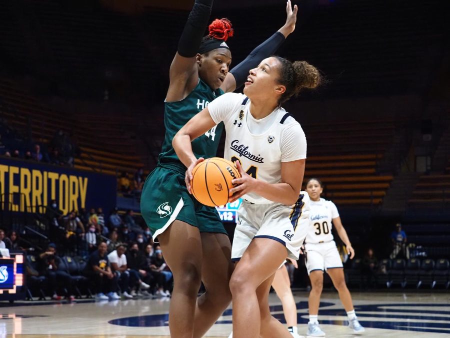 Sophomore center Isnelle Natabou attempts to stop junior forward Evelien Lutje Schipholt from scoring. Sacramento State lost their home opener to Cal 90-71 at Haas Pavilion. 