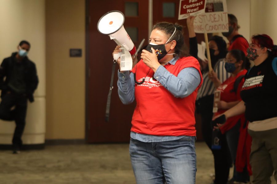 Kathy Jamieson, Sacramento State professor of kinesiology and California Faculty Association member, protests along with other CFA members on Wednesday, Nov. 3, 2021. The association argued for fair pay and diversity among faculty.