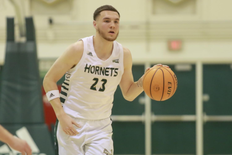 Senior Forward Bryce Fowler brings the ball up the floor against Eastern Washington Saturday, Feb. 26, 2022, in The Nest. Fowler put 26 points and six assists in his final game in the Nest as the Hornets earned their third straight win with an 81-75 victory over the Eagles.
