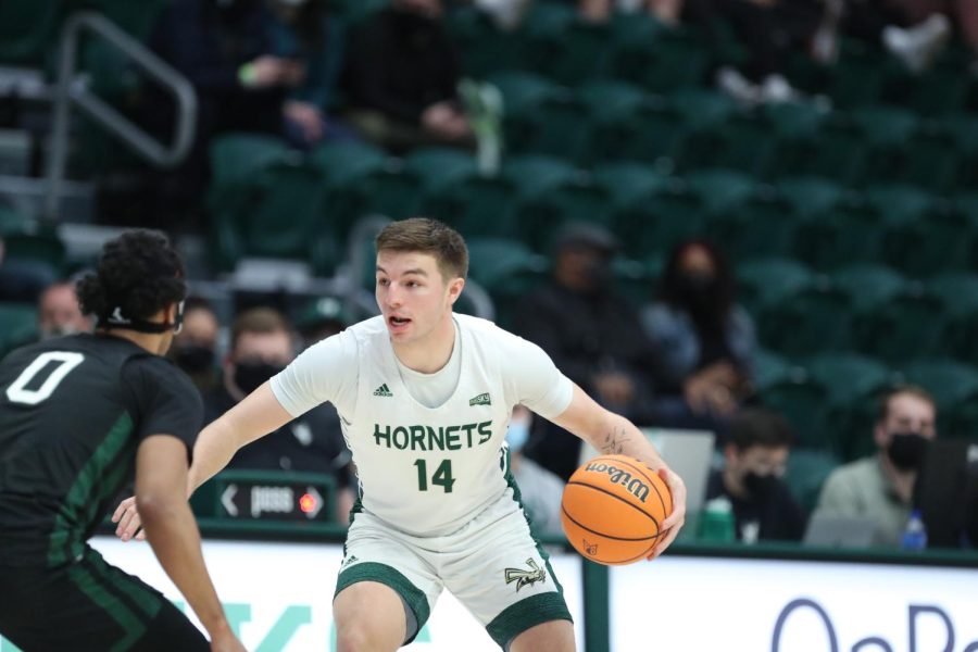 Sac State senior guard William FitzPatrick attempts to take a Portland State defender off the dribble Saturday, Feb. 5, 2022, at Viking Pavilion. FitzPatrick finished with 12 points as the Hornets suffered their second defeat to the Vikings this season in a 73-65 loss. 
