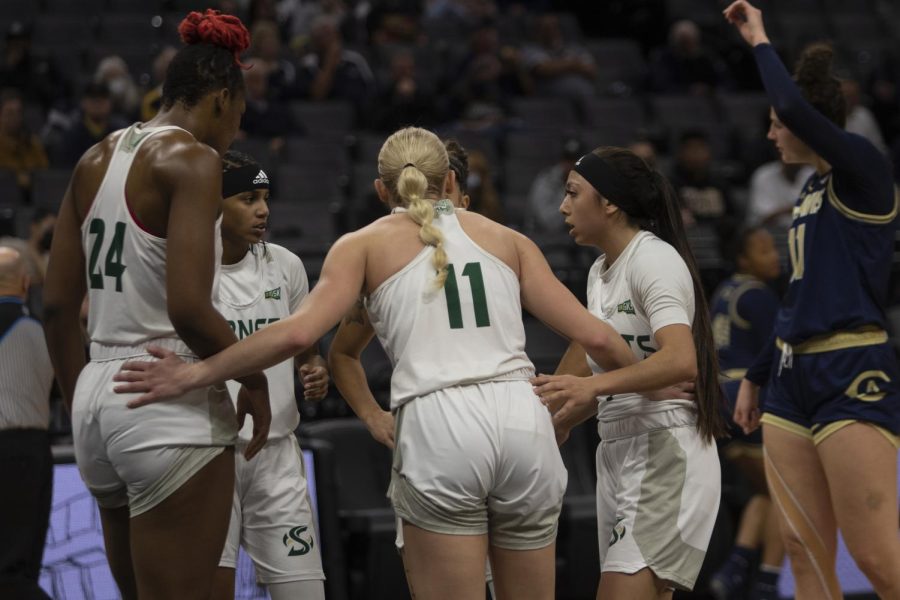 Isnelle Natabou (left), Summer Menke (middle), Jazmin Carrasco (right) gathering up after a foul during the Causeway Classic at the Golden 1 Center on Nov. 26, 2021. The Hornets suffered their biggest loss of the season 75-46 against UC Davis.