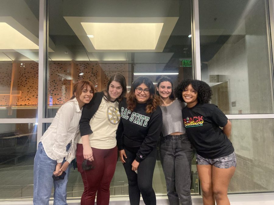 Diverse Women in Political Science board members stand in front of a window in the University Union after a club meeting on Wednesday, March 9, 2022 (left to right) Jennifer Robles, Marlies Moore, Evelyn Chavez, Elizabeth Lavezzari, Leila Cormier. Diverse Women in Political Science was founded in 2020 as a safe space for women who are passionate about political science. (Photo by Lexie Perales)
