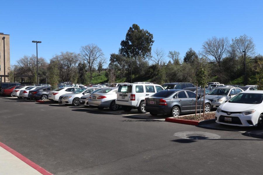 The Hornet Commons resident parking lot filled on Feb. 21. Parking spots fill quickly, which some students have said forces them to park in farther lots from their home. (Photo by Collin Houck)

