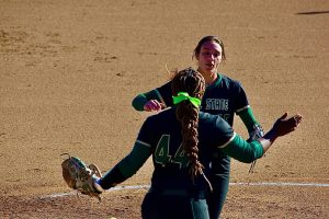 Marissa Bertuccio and Lewa Day celebrate a good inning against Dixie State at Shea Stadium on March 5, 2022. Bertuccio went 1-1 and struck out ten batters this weekend while Day went two for 11 and was able to hit her 11th home run of the season.
