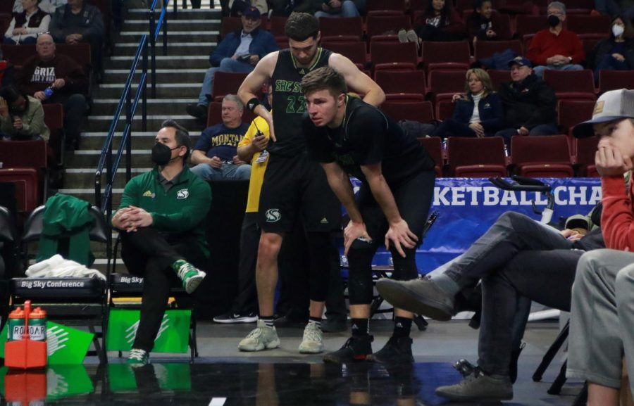 Senior forward Bryce Fowler and senior guard William FitzPatrick sit on the sideline after checking out for the final time in their second-round loss to Montana State on Thursday, March 10, 2022. The Hornets lost to the Bobcats 83-61 in the Big Sky tournament.
