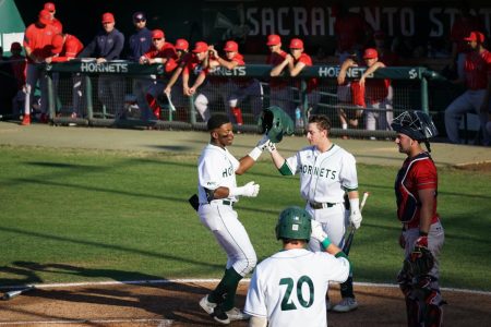 [File Photo] Freshman outfielder Jeffrey Heard (left) celebrates a home run with teammate sophomore infielder Gunner Gouldsmith (right) on Friday, March 11, 2022 against Saint Mary’s in an 8-2 Hornets loss. Heard hit his fourth home run of the season over the weekend as the Hornets won their first WAC series.
