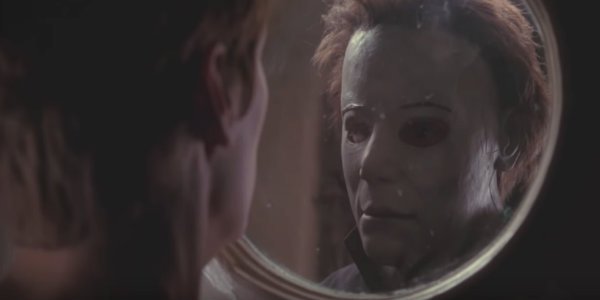 Laurie Strode (Jamie Lee Curtis) spots Michael Myers (Chris Durand) outside the window of her California home in 1998’s “Halloween: H20 Twenty Years Later”. The film is an early example of a “legacy sequel”, or a follow-up film featuring new characters and plot threads from the original film it is based on. (Courtesy of Miramax)