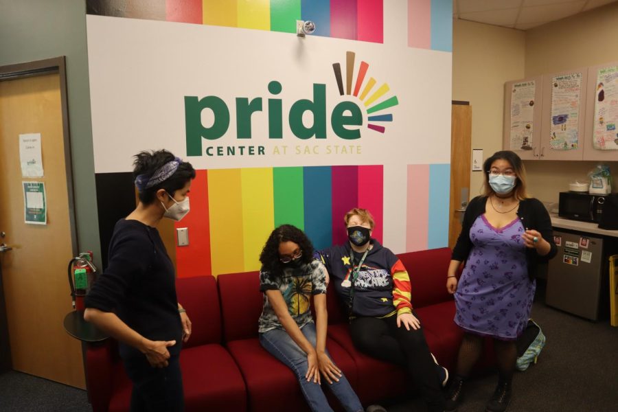  (From left to right) Pride Center coordinator Tranh Pham (they/them), sociology major Ky Hervey (she/her), undeclared major Jamie Nielsen (they/he) and international relations major Emilie Jocson (she/they) denounce the ‘Don’t Say Gay’ bill, in the Pride Center on April 6. 