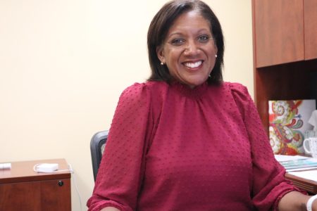 Pamm Zierfuss-Hubbard, the new Senior Associate Athletics Director for Diversity Equity and Inclusion, poses in her office on Monday, March 14, 2022. In this position, Zierfuss-Hubbard will lead ongoing efforts to diversify the staff within the athletics department.
(Photo by Keyshawn Davis)