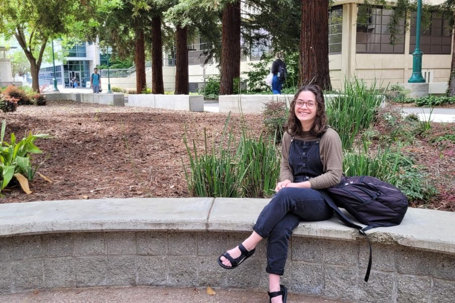 Sarah Budean, a junior with an undeclared major, sits in front of the University Union on Monday, April 4, 2022. Though she said she didn’t know much about the upcoming ASI board elections, Budean offered her thoughts on what an ideal candidate should do to earn more votes.