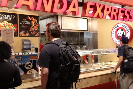 Students in the University Union in line waiting to order from Panda Express on Tuesday, May 3, 2022. The fast-food restaurant was voted best food on campus at Sac State. (Photo by Collin Houck)