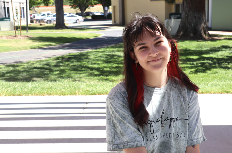 Sarah Putirka, a second year studio art major, sits outside of the university theatre on Tuesday, May 3, 2022. Putirka says she is not surprised that Arts and Letters won best college for Best of Sac State. 