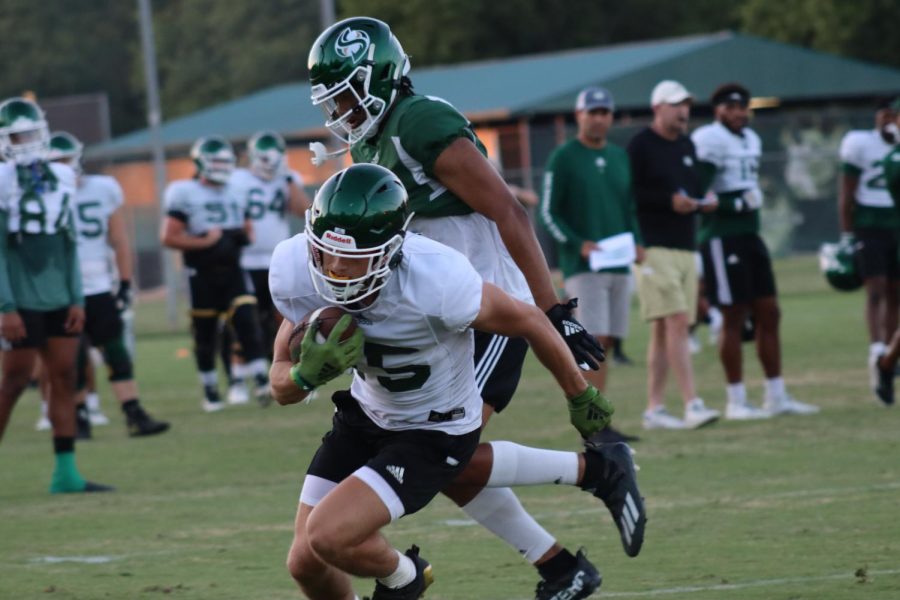 Sophomore Hornet receiver Sawyer Merrill (15) getting upfield after a catch Monday, Aug. 15, 2022, during practice. The Hornets are gunning for their third straight Big Sky title as the season kicks off at Hornet Stadium against Utah Tech University Saturday, Sept. 3 at 6:00 p.m PST.