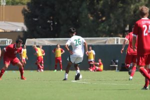 Freshman midfielder Danny Govea takes on LMU defender at the Hornet field on Thursday, Sept. 8, 2022. Govea helped control the pace in the midfield in the first half for the Hornets in their 2-1 win.